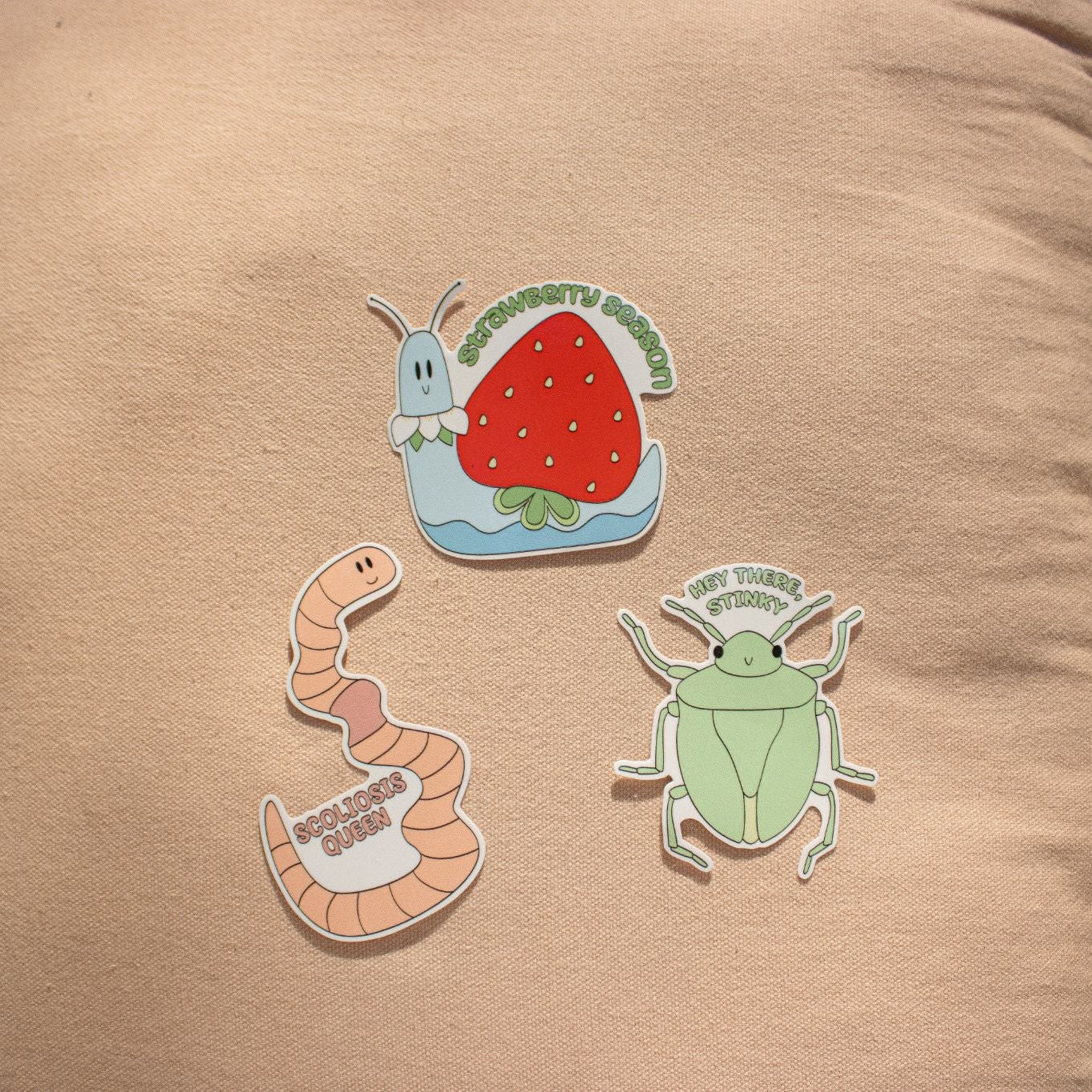 Strawberry Season sticker with two other stickers.